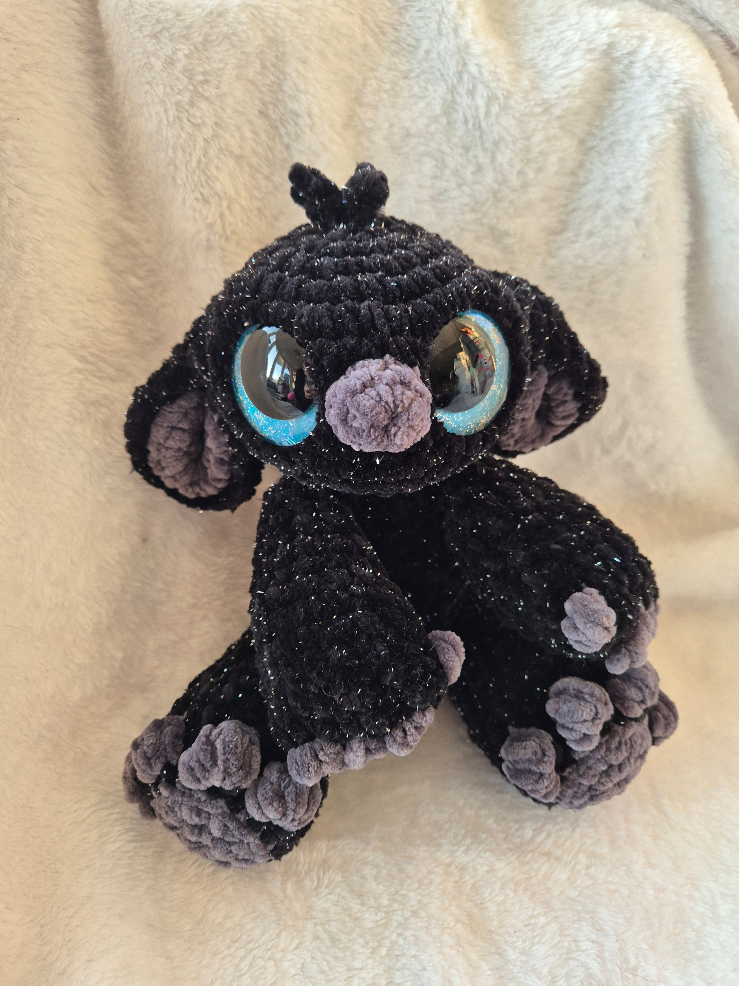 Black sparkly alien plush