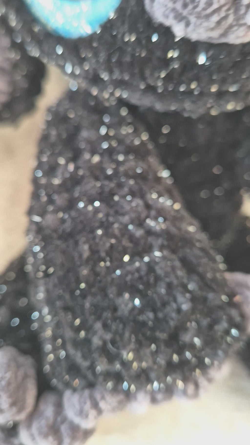 Black sparkly alien plush